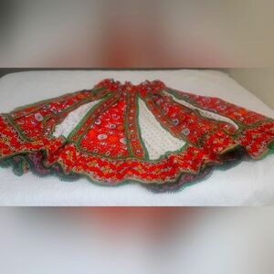 Traditional Lengha Choli women in stunning red, green, white, and yellow